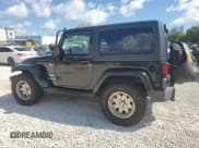 ✅ 2011 Jeep Wrangler Sahara • VIN: 1J4GA5D16BL550388 • Lot: 82650165. Listed on Copart with 197,063 mi. Free auction sales archive from the USA and detailed vehicle history report at DreamBid. Image 2.