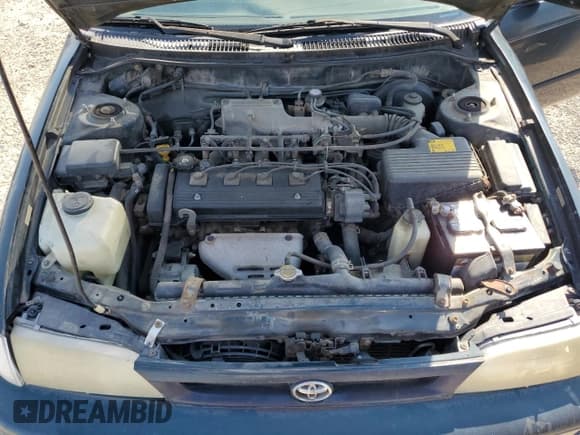 ✅ 1996 Toyota Corolla DX • VIN: 1NXBB02E8TZ387353 • Lot: 69556895. Listed on Copart with 187,677 mi. Free auction sales archive from the USA and detailed vehicle history report at DreamBid. Image 11.