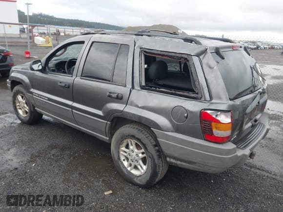 ✅ 2002 Jeep Grand Cherokee Laredo • VIN: 1J4GW48S12C232340 • Lot: 43572402. Listed on IAAI with Not provided. Free auction sales archive from the USA and detailed vehicle history report at DreamBid. Image 3.