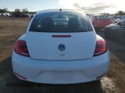 ✅ 2014 Volkswagen Beetle 2.0L TDI w/Sun/Sound/Nav • VIN: 3VWJL7ATXEM640246 • Лот: 69774095. Опубликован ранее на Copart с пробегом 155 361 миль. Бесплатный доступ к архиву аукционных продаж из США и подробный отчёт об истории автомобиля на DreamBid. Изображение 6.