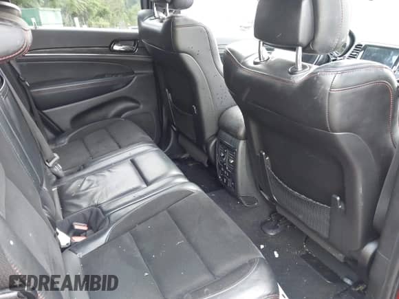 2021 Jeep Grand Cherokee Trailhawk with VIN 1C4RJFLGXMC579888, listed as a IAAI auction lot 42951354 with 76,948 mi miles and . Bid and sale history available at DreamBid. Image 8.