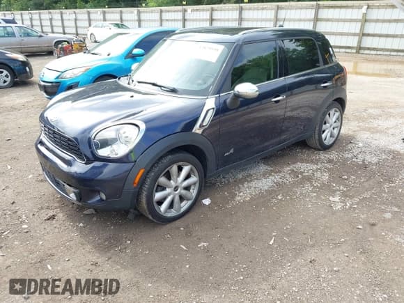 ✅ 2014 MINI Countryman S • VIN: WMWZC5C50EWP40619 • Lot: 42879559. Listed on IAAI with 187,185 mi. Free auction sales archive from the USA and detailed vehicle history report at DreamBid. Image 2.