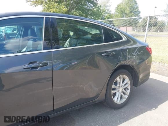 ✅ 2018 Chevrolet Malibu LT • VIN: 1G1ZD5STXJF119746 • Lot: 43173441. Listed on IAAI with 92,484 mi. Free auction sales archive from the USA and detailed vehicle history report at DreamBid. Image 6.