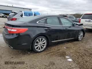 2014 Hyundai Azera Limited с VIN KMHFH4JG4EA346507, выставлен на аукционе Copart как лот 82012574 с пробегом 74 208 миль миль и Списание • Salvage title. История ставок и продаж доступна на DreamBid. Изображение 3.
