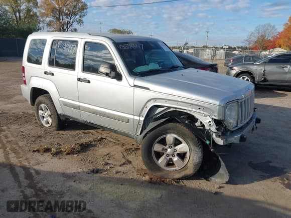 ✅ 2012 Jeep Liberty Sport • VIN: 1C4PJMAK9CW118116 • Lot: 43596447. Listed on IAAI with 143,468 mi. Free auction sales archive from the USA and detailed vehicle history report at DreamBid. Image 1.