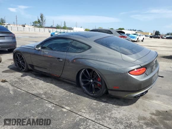 ✅ 2022 Bentley Continental GT GT V8 • VIN: SCBCG2ZG3NC093058 • Lot: 66557405. Listed on Copart with 9,760 mi. Free auction sales archive from the USA and detailed vehicle history report at DreamBid. Image 2.