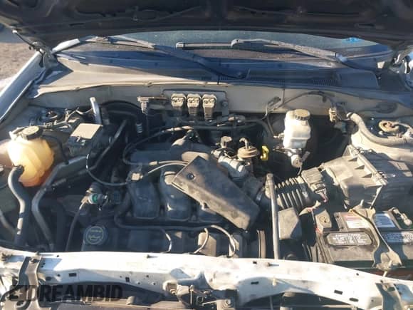 2006 Mercury Mariner Luxury z VIN 4M2YU571X6DJ04235, wystawiony jako IAAI lot #41631062 z przebiegiem 290 925 mil mil oraz . Historia ofert i sprzedaży dostępna na DreamBid. Obrazek 10.