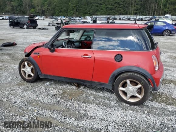 ✅ 2002 MINI Hardtop • VIN: WMWRC33462TE12083 • Lot: 56871845. Listed on Copart with 343,129 mi. Free auction sales archive from the USA and detailed vehicle history report at DreamBid. Image 2.