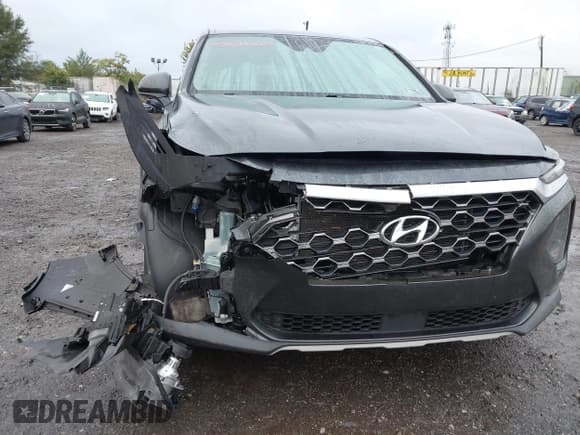 ✅ 2020 Hyundai Santa Fe SEL • VIN: 5NMS3CAD4LH202833 • Лот: 43434662. Опубликован ранее на IAAI с пробегом 76 924 миль. Бесплатный доступ к архиву аукционных продаж из США и подробный отчёт об истории автомобиля на DreamBid. Изображение 6.