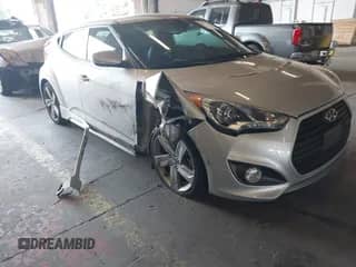 2013 Hyundai Veloster Turbo с VIN KMHTC6AEXDU145719, выставлен на аукционе IAAI как лот 43144474 с пробегом 51 191 миль миль и . История ставок и продаж доступна на DreamBid. Изображение 1.