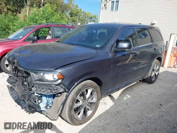 2016 Dodge Durango R/T z VIN 1C4SDJCT3GC422734, wystawiony jako IAAI lot #43249972 z przebiegiem 166 148 mil mil oraz . Historia ofert i sprzedaży dostępna na DreamBid. Obrazek 2.