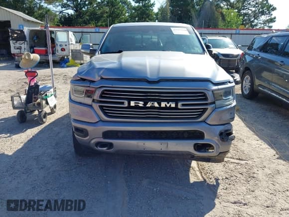 ✅ 2022 Ram 1500 Laramie • VIN: 1C6RREJTXNN125172 • Lot: 43329494. Listed on IAAI with 126,637 mi. Free auction sales archive from the USA and detailed vehicle history report at DreamBid. Image 13.
