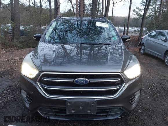 ✅ 2017 Ford Escape Titanium • VIN: 1FMCU0JD0HUC13307 • Lot: 43883887. Wystawiony na IAAI z przebiegiem 71 756 mil. Bezpłatny archiwum sprzedaży aukcyjnych z USA i szczegółowy raport historii pojazdu na DreamBid. Zdjęcie 6.