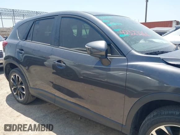 ✅ 2016 Mazda CX-5 Grand Touring • VIN: JM3KE2DY1G0692633 • Лот: 42327766. Опубликован ранее на IAAI с пробегом 128 050 миль. Бесплатный доступ к архиву аукционных продаж из США и подробный отчёт об истории автомобиля на DreamBid. Изображение 13.