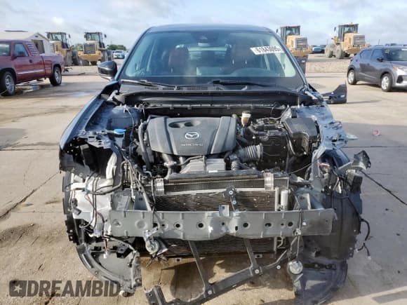 ✅ 2021 Mazda CX-5 Touring • VIN: JM3KFACM3M0385823 • Lot: 61843095. Listed on Copart with 50,524 mi. Free auction sales archive from the USA and detailed vehicle history report at DreamBid. Image 5.