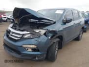 ✅ 2017 Honda Pilot EX-L • VIN: 5FNYF6H5XHB001772 • Lot: 43771030. Listed on IAAI with 126,659 mi. Free auction sales archive from the USA and detailed vehicle history report at DreamBid. Image 2.