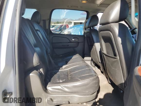 2013 Chevrolet Suburban LT с VIN 1GNSKJE7XDR130505, выставлен на аукционе Copart как лот 71925415 с пробегом 293 158 миль миль и Списание • Salvage title. История ставок и продаж доступна на DreamBid. Изображение 11.