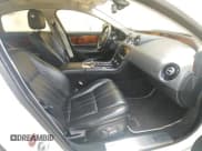 ✅ 2013 Jaguar XJ • VIN: SAJWJ1CD7D8V49599 • Lot: 54008915. Listed on Copart with 133,163 mi. Free auction sales archive from the USA and detailed vehicle history report at DreamBid. Image 5.