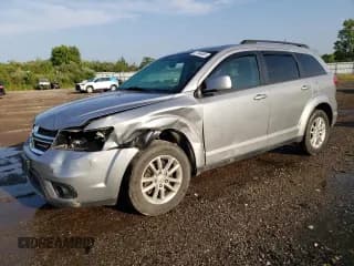 ✅ 2015 Dodge Journey SXT • VIN: 3C4PDCBG7FT627773 • Лот: 67106455. Опубликован ранее на Copart с пробегом 155 532 миль. Бесплатный доступ к архиву аукционных продаж из США и подробный отчёт об истории автомобиля на DreamBid. Изображение 1.