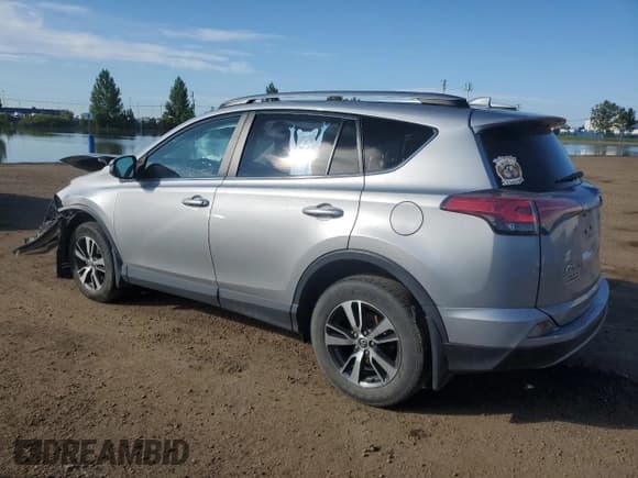 ✅ 2018 Toyota RAV4 XLE • VIN: 2T3RFREV6JW825651 • Лот: 66492515. Опубликован ранее на Copart с пробегом 76 952 миль. Бесплатный доступ к архиву аукционных продаж из США и подробный отчёт об истории автомобиля на DreamBid. Изображение 2.