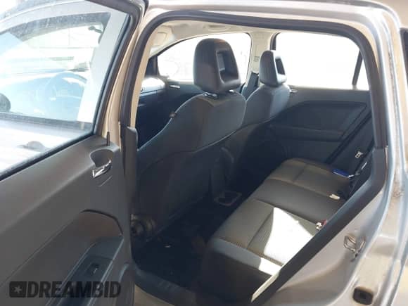 2009 Dodge Caliber SXT с VIN 1B3HB48A69D148629, выставлен на аукционе IAAI как лот 41303854 с пробегом 58 536 миль миль и . История ставок и продаж доступна на DreamBid. Изображение 8.