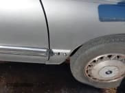 ✅ 1996 Buick LeSabre Custom • VIN: 1G4HP52KXTH428234 • Lot: 41569901. Wystawiony na IAAI z przebiegiem 179 350 mil. Bezpłatny archiwum sprzedaży aukcyjnych z USA i szczegółowy raport historii pojazdu na DreamBid. Zdjęcie 13.