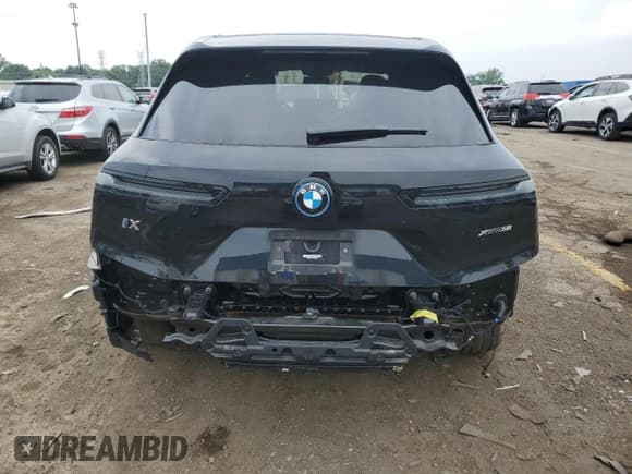 ✅ 2024 BMW iX xDrive50 • VIN: WB523CF01RCN55992 • Лот: 59352604. Опубликован ранее на Copart с пробегом 8 415 миль. Бесплатный доступ к архиву аукционных продаж из США и подробный отчёт об истории автомобиля на DreamBid. Изображение 6.