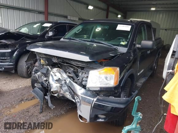 ✅ 2015 Nissan Titan SL • VIN: 1N6BA0ED7FN512364 • Lot: 43203608. Listed on IAAI with 106,996 mi. Free auction sales archive from the USA and detailed vehicle history report at DreamBid. Image 17.