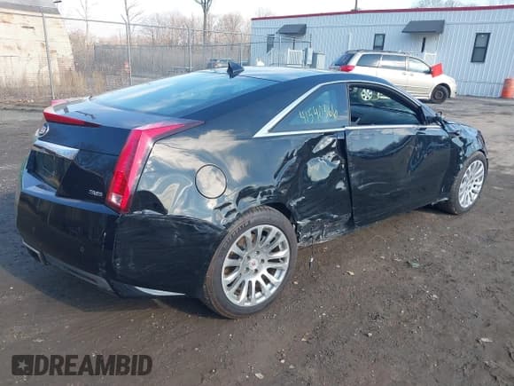 ✅ 2014 Cadillac CTS Premium • VIN: 1G6DH1E32E0177775 • Lot: 41540366. Listed on IAAI with 106,398 mi. Free auction sales archive from the USA and detailed vehicle history report at DreamBid. Image 4.