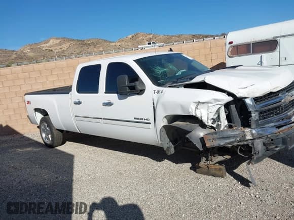 ✅ 2014 Chevrolet Silverado 2500HD LT • VIN: 1GC1CXCG5EF107871 • Lot: 43518202. Listed on IAAI with 74,569 mi. Free auction sales archive from the USA and detailed vehicle history report at DreamBid. Image 14.