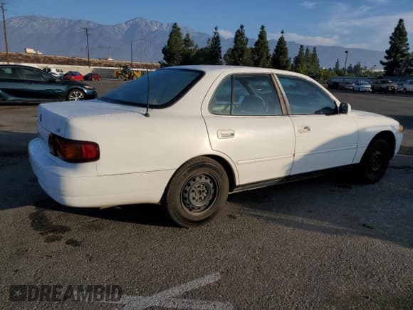 ✅ 1996 Toyota Camry DX • VIN: 4T1BG12K7TU943133 • Lot: 75562894. Listed on Copart with 200,429 mi. Free auction sales archive from the USA and detailed vehicle history report at DreamBid. Image 3.