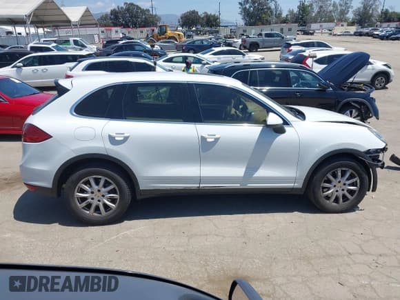 ✅ 2012 Porsche Cayenne • VIN: WP1AA2A22CLA08941 • Lot: 42152243. Listed on IAAI with 120,122 mi. Free auction sales archive from the USA and detailed vehicle history report at DreamBid. Image 14.