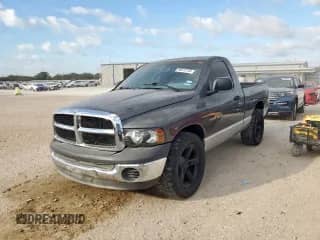 2002 Dodge 1500 with VIN 1D7HA16K32J214675, listed as a Copart auction lot 86512145 with 160,614 mi miles and Salvage title. Bid and sale history available at DreamBid. Image 1.