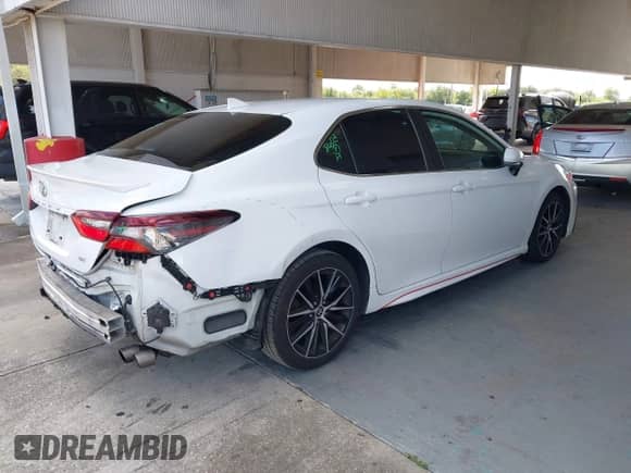 2023 Toyota Camry SE Nightshade с VIN 4T1T11AK5PU766434, выставлен на аукционе IAAI как лот 43288110 с пробегом 99 596 миль миль и . История ставок и продаж доступна на DreamBid. Изображение 4.