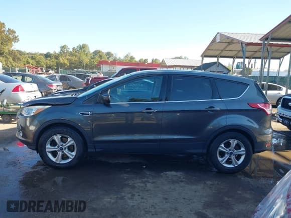 ✅ 2016 Ford Escape SE • VIN: 1FMCU9GX4GUC20913 • Lot: 43420226. Listed on IAAI with 112,669 mi. Free auction sales archive from the USA and detailed vehicle history report at DreamBid. Image 14.