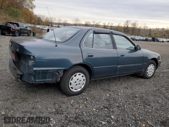 ✅ 1996 Toyota Camry DX • VIN: JT2BG12K2T0413821 • Лот: 85959915. Опубликован ранее на Copart с пробегом 85 999 миль. Бесплатный доступ к архиву аукционных продаж из США и подробный отчёт об истории автомобиля на DreamBid. Изображение 3.
