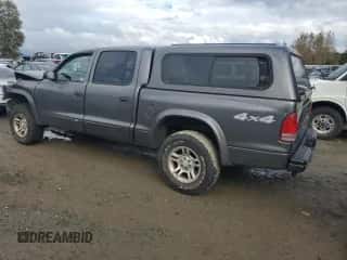 2004 Dodge Dakota Sport z VIN 1D7HG38N04S504239, wystawiony jako Copart lot #75068004 z przebiegiem 194 197 mil mil oraz Szkoda całkowita • Salvage title. Historia ofert i sprzedaży dostępna na DreamBid. Obrazek 2.