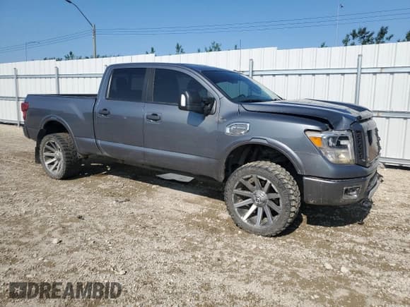 ✅ 2018 Nissan Titan Pro-4X • VIN: 1N6BA1F45JN528317 • Lot: 60898045. Wystawiony na Copart z przebiegiem 180 329 mil. Bezpłatny archiwum sprzedaży aukcyjnych z USA i szczegółowy raport historii pojazdu na DreamBid. Zdjęcie 4.