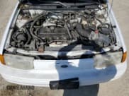 ✅ 1993 Ford Escort • VIN: 3FAPP15J0PR178136 • Lot: 55252715. Listed on Copart with 29,996 mi. Free auction sales archive from the USA and detailed vehicle history report at DreamBid. Image 11.