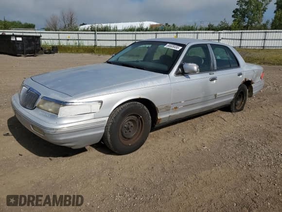 ✅ 1997 Mercury Grand Marquis GS • VIN: 2MELM74WXVX649188 • Lot: 66835365. Listed on Copart with 147,213 mi. Free auction sales archive from the USA and detailed vehicle history report at DreamBid. Image 1.