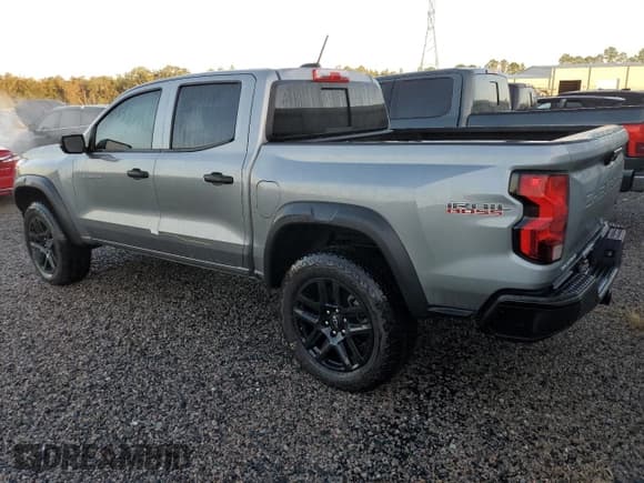 ✅ 2023 Chevrolet Colorado 4WD Trail Boss • VIN: 1GCPTEEK4P1148878 • Lot: 73843404. Wystawiony na Copart z przebiegiem 5 124 mil. Bezpłatny archiwum sprzedaży aukcyjnych z USA i szczegółowy raport historii pojazdu na DreamBid. Zdjęcie 2.
