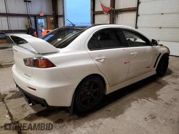 ✅ 2012 Mitsubishi Lancer Evolution GSR • VIN: JA32W8FV0CU604474 • Lot: 82673054. Wystawiony na Copart z przebiegiem Nie podano. Bezpłatny archiwum sprzedaży aukcyjnych z USA i szczegółowy raport historii pojazdu na DreamBid. Zdjęcie 3.