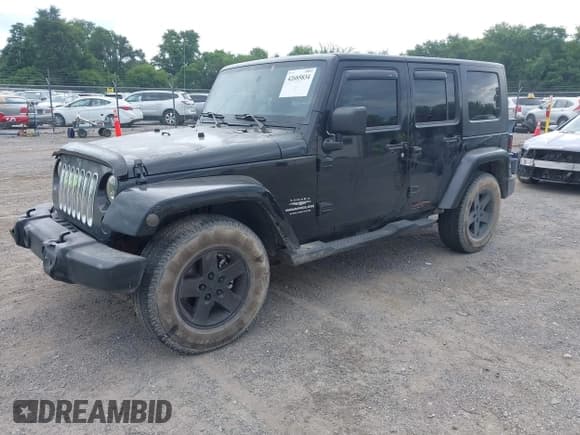 ✅ 2007 Jeep Wrangler Unlimited Sahara • VIN: 1J4GB59187L136350 • Lot: 42685834. Listed on IAAI with 186,515 mi. Free auction sales archive from the USA and detailed vehicle history report at DreamBid. Image 2.