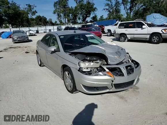 ✅ 2009 Pontiac G6 1SB • VIN: 1G2ZJ57B494245077 • Лот: 93170145. Опубликован ранее на Copart с пробегом 141 415 миль. Бесплатный доступ к архиву аукционных продаж из США и подробный отчёт об истории автомобиля на DreamBid. Изображение 13.