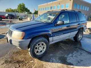 ✅ 2000 Jeep Grand Cherokee Laredo • VIN: 1J4GW48S0YC260736 • Lot: 81474135. Listed on Copart with 232,529 mi. Free auction sales archive from the USA and detailed vehicle history report at DreamBid. Image 1.