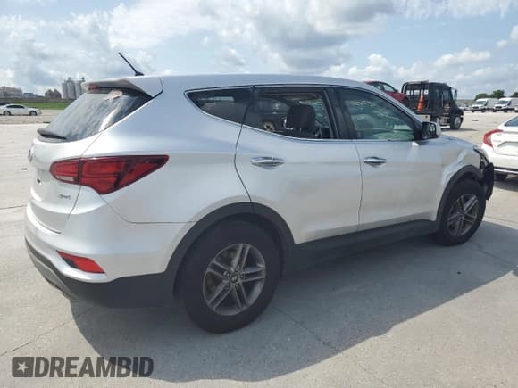 ✅ 2018 Hyundai Santa Fe 2.4L • VIN: 5XYZT3LB9JG545770 • Лот: 57638114. Опубликован ранее на Copart с пробегом Не указан. Бесплатный доступ к архиву аукционных продаж из США и подробный отчёт об истории автомобиля на DreamBid. Изображение 3.