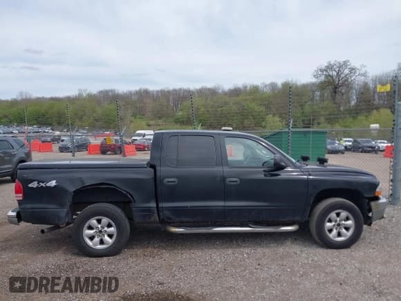 ✅ 2004 Dodge Dakota SLT • VIN: 1D7HG48N54S664848 • Lot: 42152635. Wystawiony na IAAI z przebiegiem 153 824 mil. Bezpłatny archiwum sprzedaży aukcyjnych z USA i szczegółowy raport historii pojazdu na DreamBid. Zdjęcie 13.