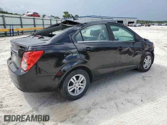 2012 Chevrolet Sonic LT z VIN 1G1JC5SB0C4187463, wystawiony jako Copart lot #68758074 z przebiegiem 123 060 mil mil oraz Szkoda całkowita • Salvage title. Historia ofert i sprzedaży dostępna na DreamBid. Obrazek 3.