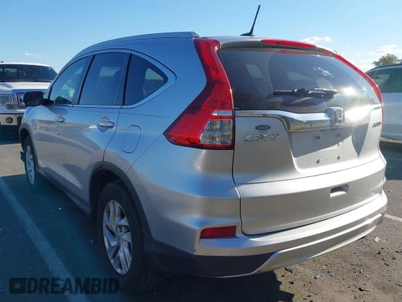 ✅ 2015 Honda CR-V EX-L • VIN: 2HKRM4H78FH629909 • Lot: 43535408. Listed on IAAI with 135,973 mi. Free auction sales archive from the USA and detailed vehicle history report at DreamBid. Image 3.