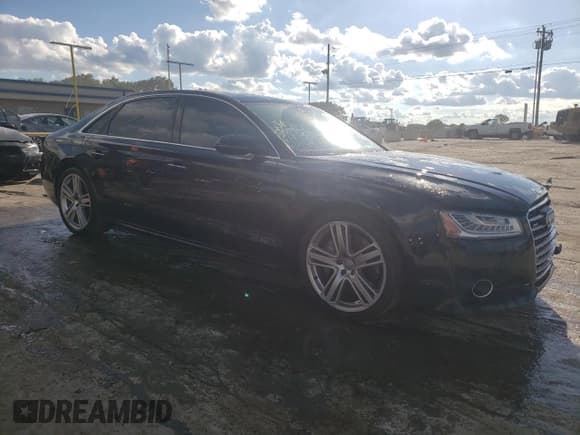 ✅ 2016 Audi A8 Sport • VIN: WAU43AFD1GN022060 • Лот: 64232033. Опубликован ранее на Copart с пробегом 91 208 миль. Бесплатный доступ к архиву аукционных продаж из США и подробный отчёт об истории автомобиля на DreamBid. Изображение 4.